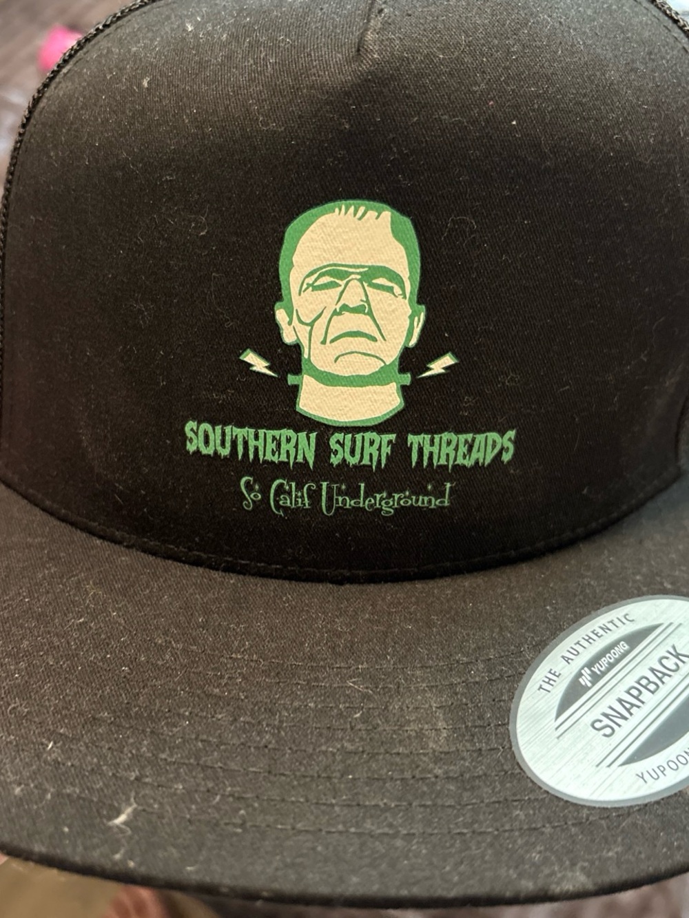 The Classic Black Snapback Hat with Lime Green Graphic